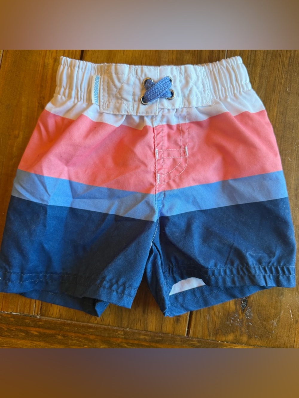 Rugged Butts Striped Baby Boy 3-6 months Swim Trunks in Coral, Light Blue & Navy